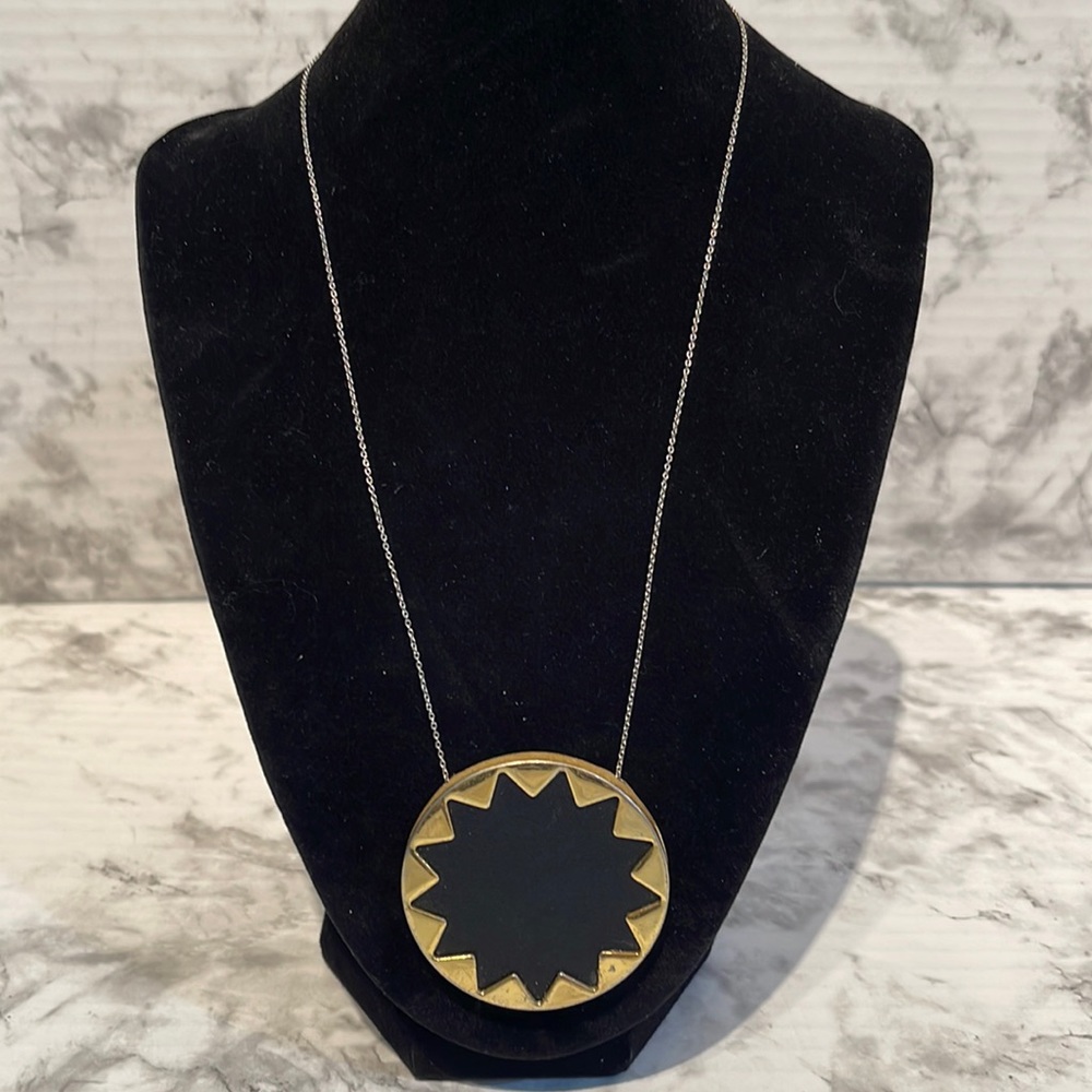 Vintage House of Harlow 1960 large gold one pendant with leather underlay